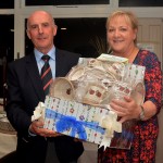 Ladies Winner Bernie Byrne receiving her prize from President Kieran Lucas